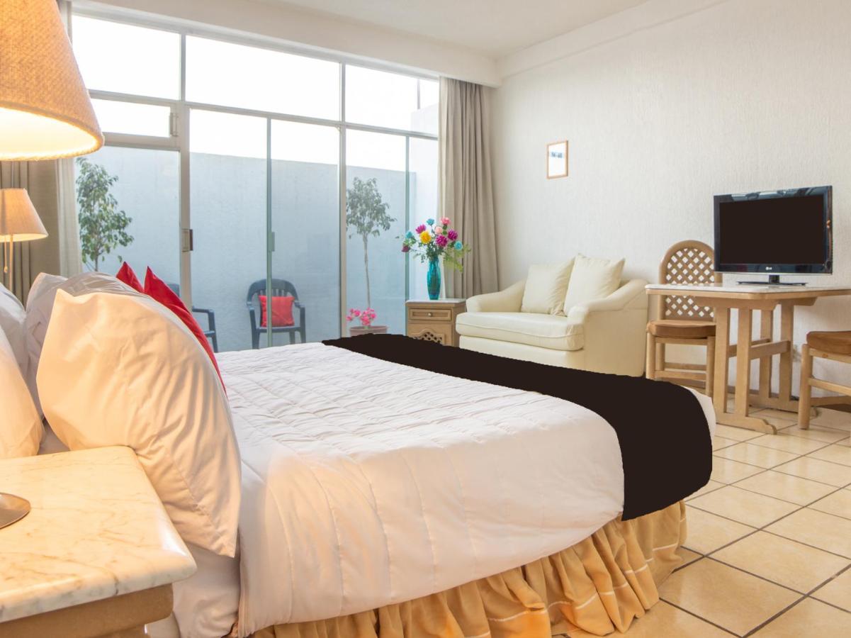 Capital O Hotel Villa Monini Puebla Buitenkant foto